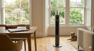Detailed view of the fine-mesh safety grille on a rechargeable tower fan, highlighting the child-friendly and pet-safe design.