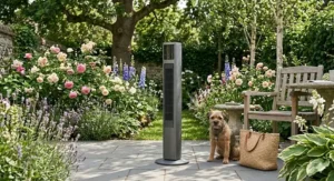 Close-up of a hand grasping the integrated carry handle of a portable rechargeable tower fan to move it easily between rooms.