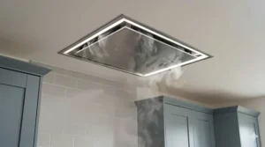 A sleek ceiling-mounted kitchen extractor fan with perimeter lighting, powerful enough for open-plan island cooking.