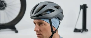 Low-profile cooling skull cap worn comfortably underneath a cycling helmet.