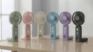 A stylish collection of foldable handheld fans displayed in popular pastel and neutral colour variants.