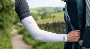 Lightweight compression cooling arm sleeves featuring a secure bicep band.