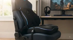 Thick, contoured gaming chair cooling pad installed on a high-back ergonomic gaming chair.