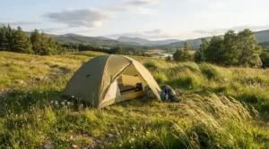 Staying cool during a heatwave with a solar powered fan for off grid camping set up outside a dome tent.